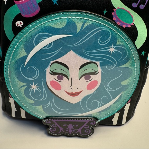 NWT. Loungefly Disney\'s The Haunted Mansion Madame Leota Mini Backpack glows main image 13